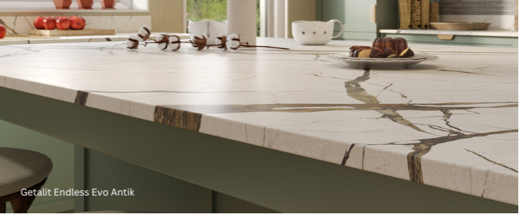 Kitchen island with marble countertop and bar stools