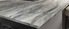 Marble countertop with kitchen interior background
